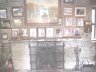 The photos on the mantel are almost all of Sir Harry Andrews--Founder of K.O.G.T. and builder of the Castle..